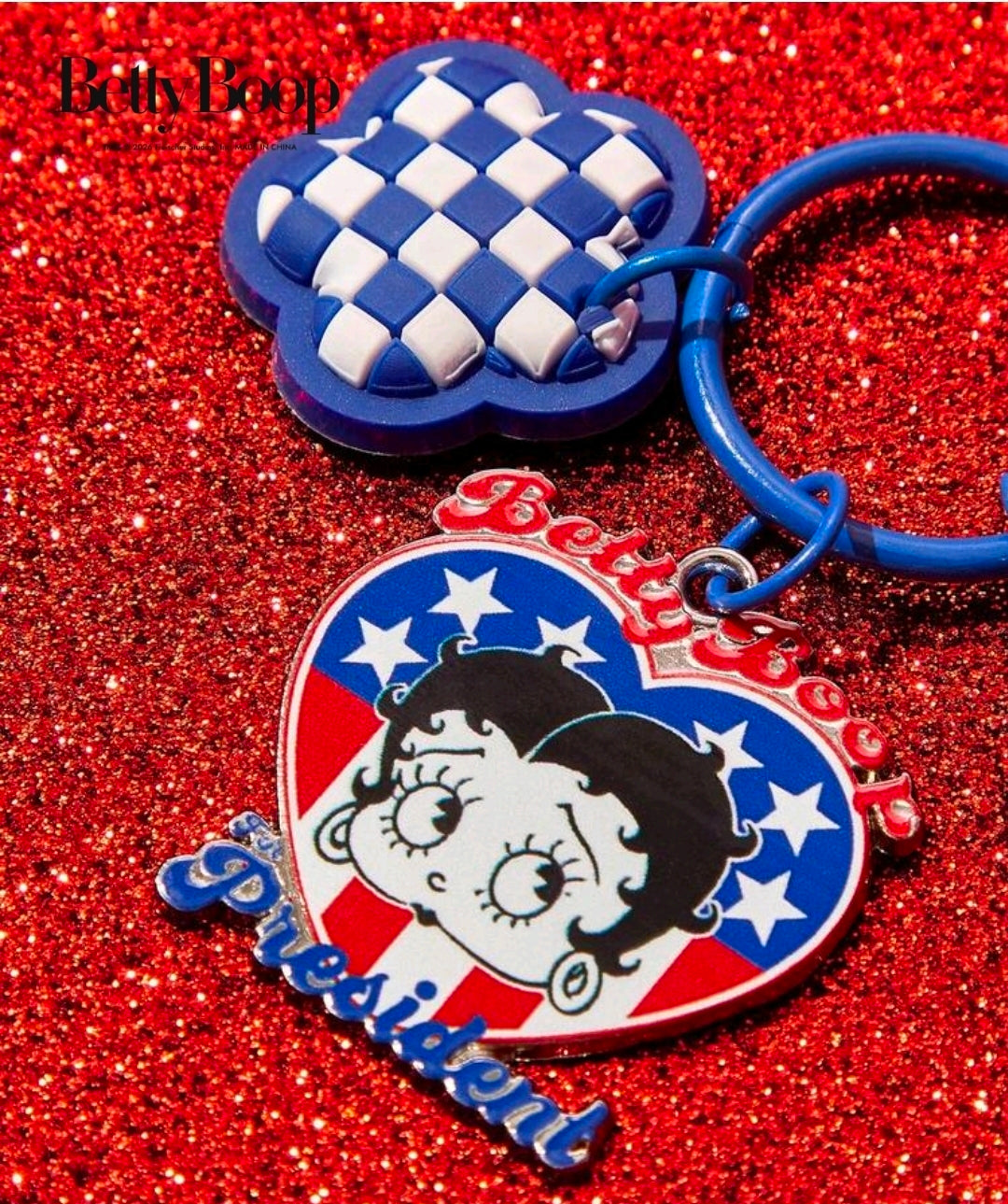 Close-up patriotic Betty Boop enamel keychain: check heart top and President badge charm