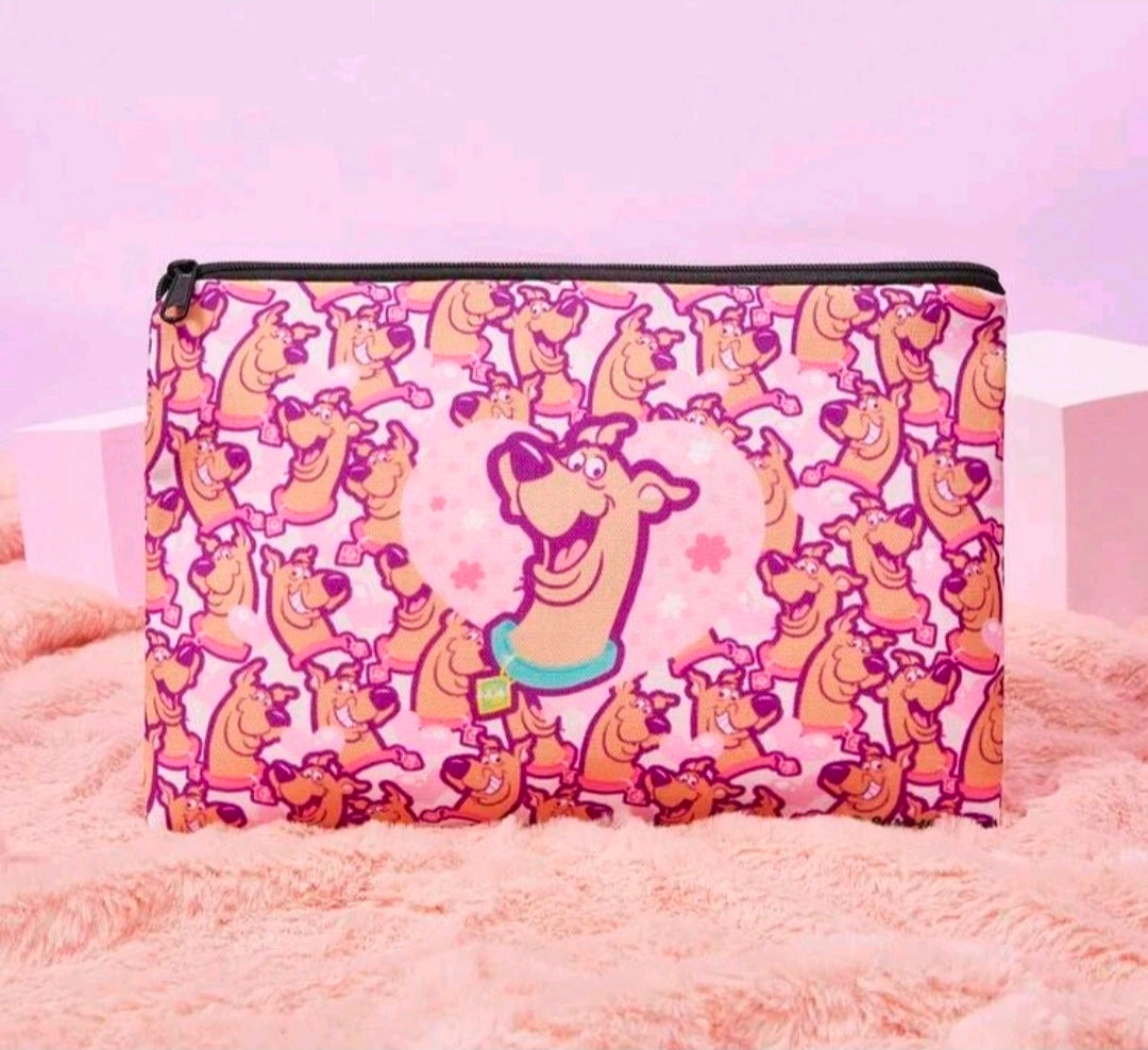 Pink Scooby-Doo makeup pouch with black zipper and repeating character pattern