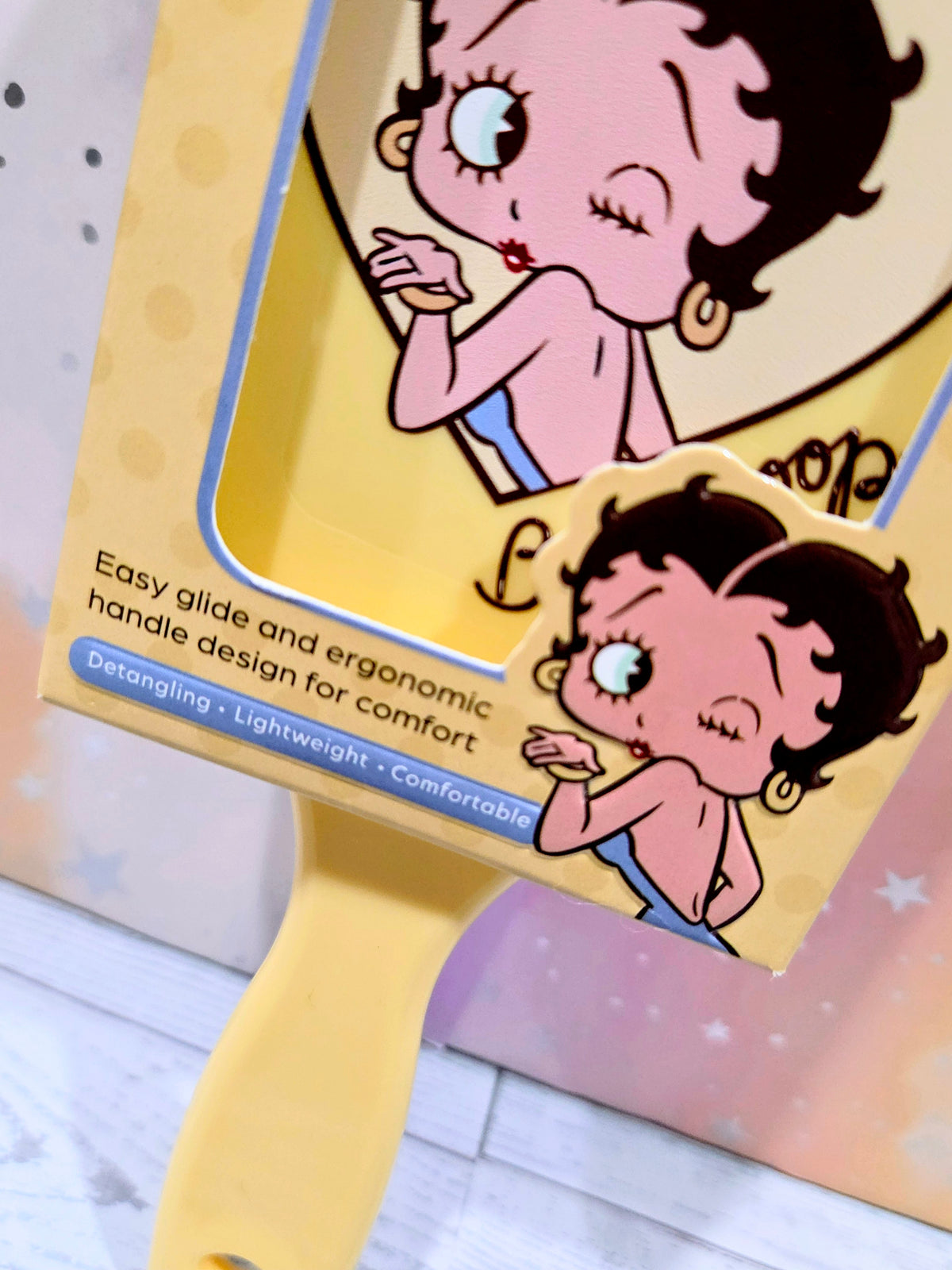 Celavi Betty Boop paddle hair brush, yellow handle with cartoon character graphic