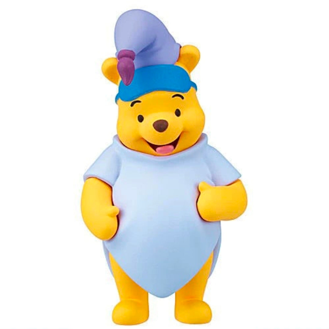 Winnie the Pooh character figure in light blue tunic with purple hat, standing pose