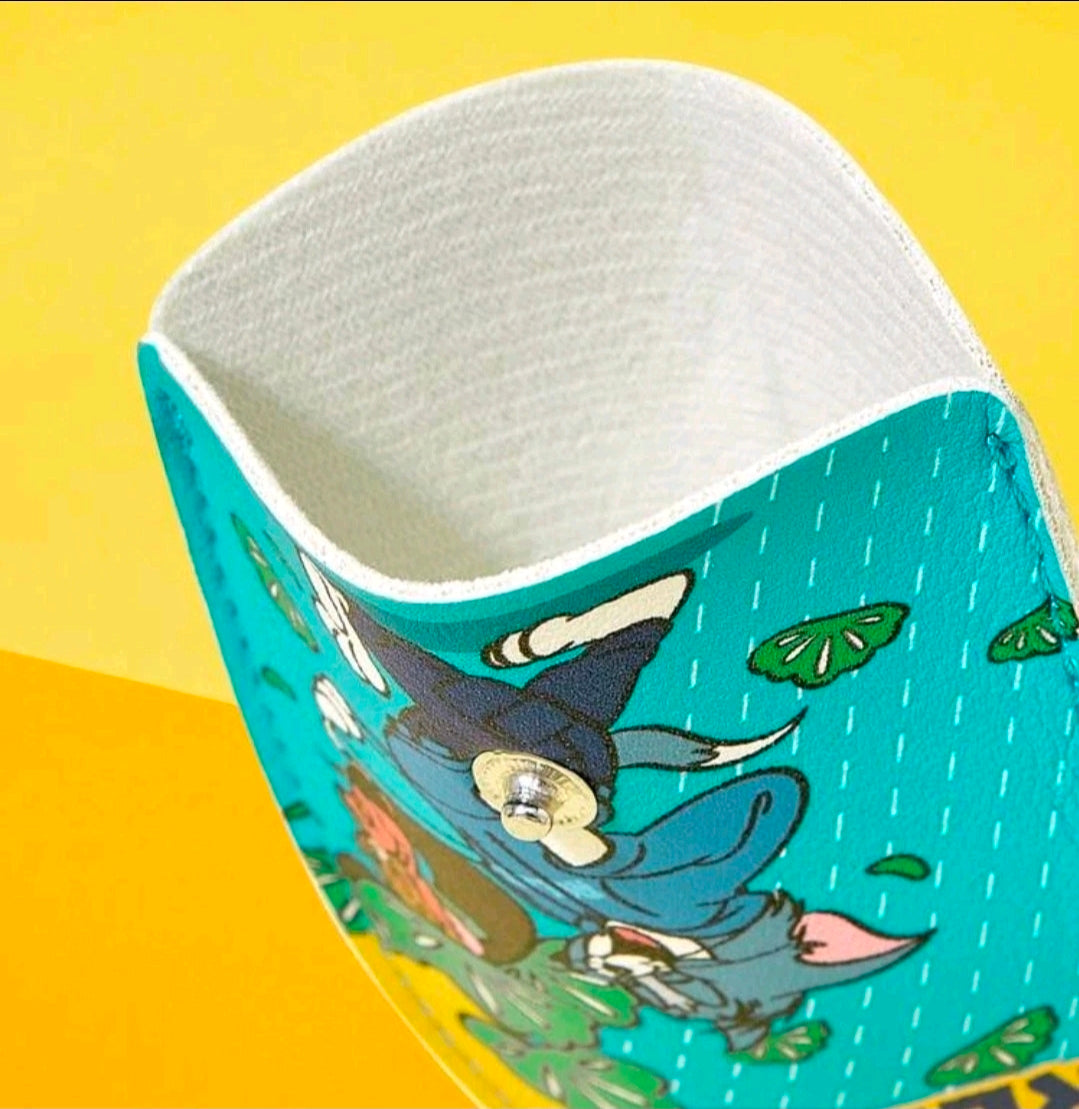 Teal pouch with white inner lining and cartoon cat face graphic