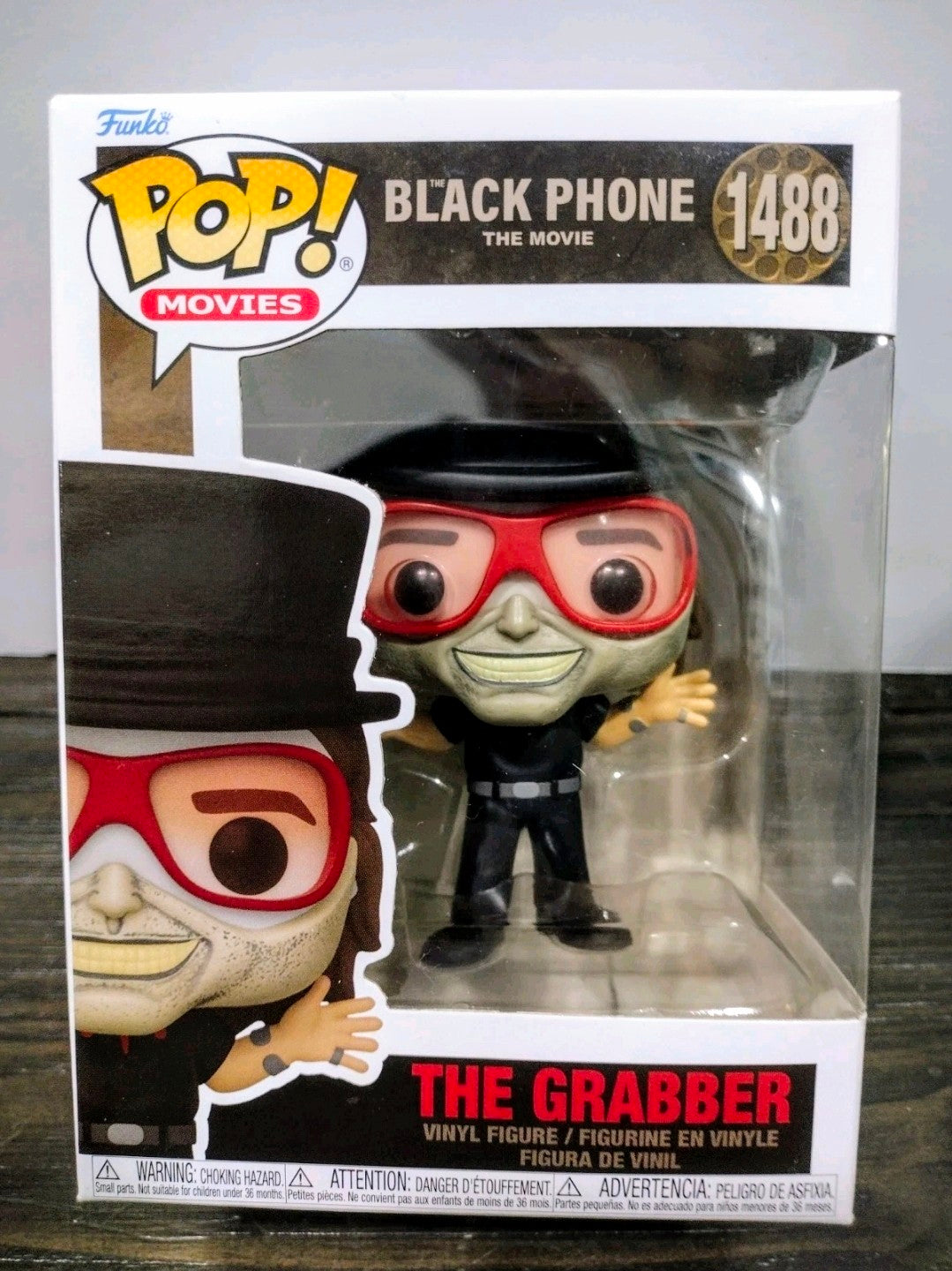 Funko Pop vinyl figure The Grabber in clear blister, red goggles, black outfit