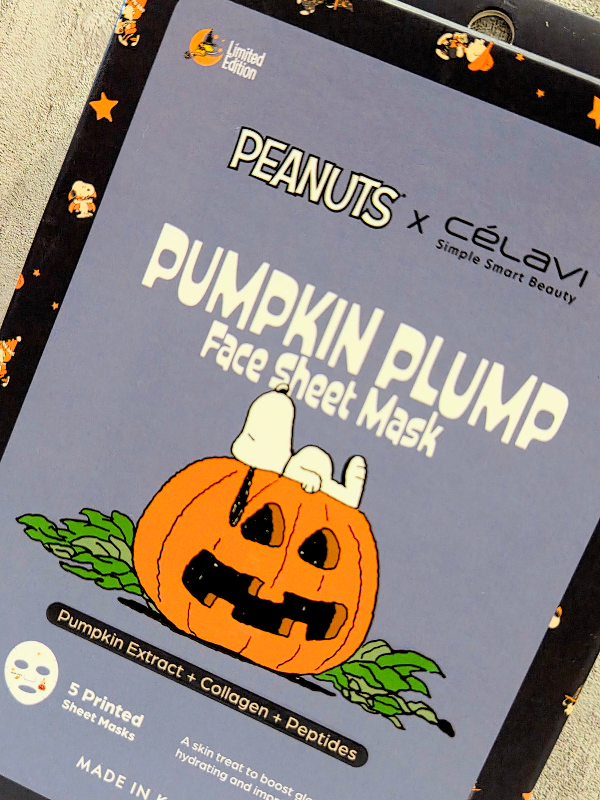 Peanuts x Celavi Pumpkin Plump face sheet mask box with Snoopy and jack-o'-lantern