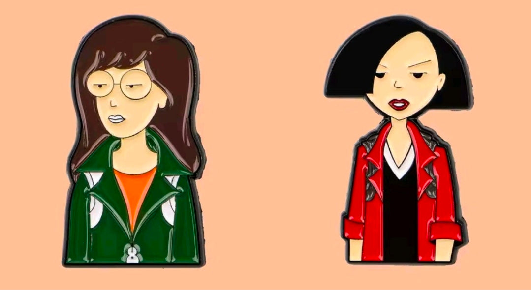 Enamel character pin set: Jane in green jacket and a character in a red coat.