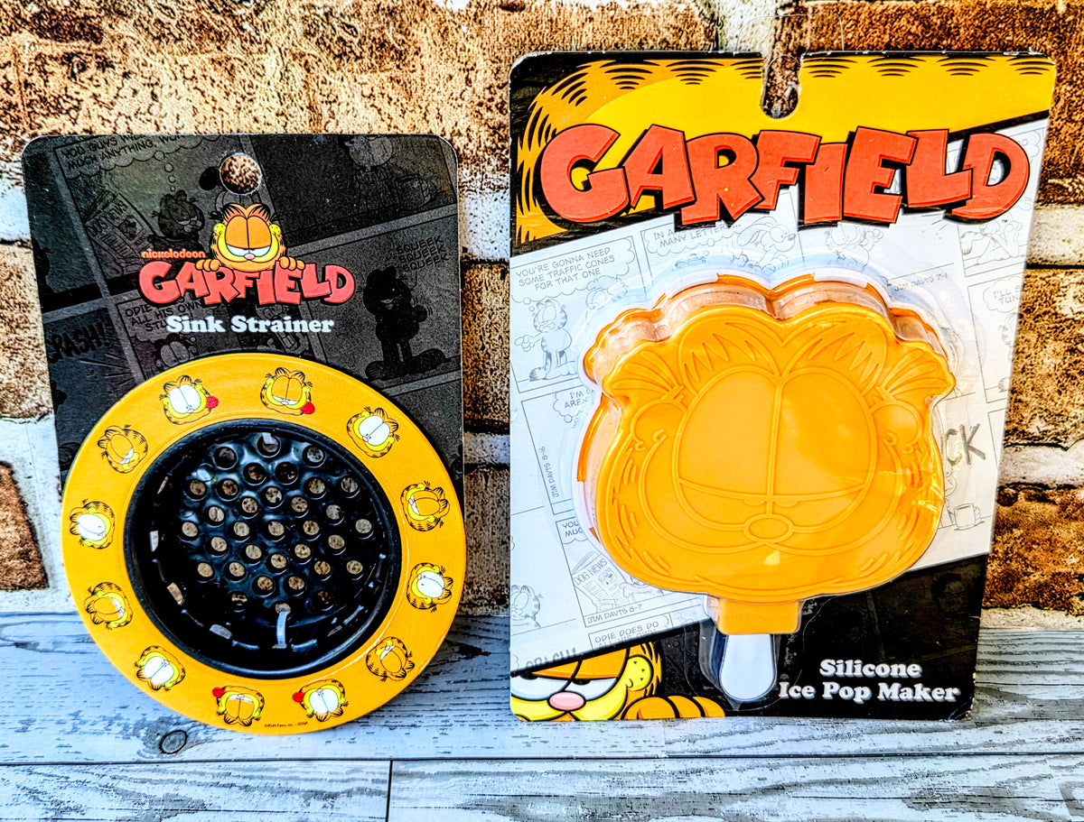 Garfield kitchen sink strainer and orange silicone ice pop maker, boxed