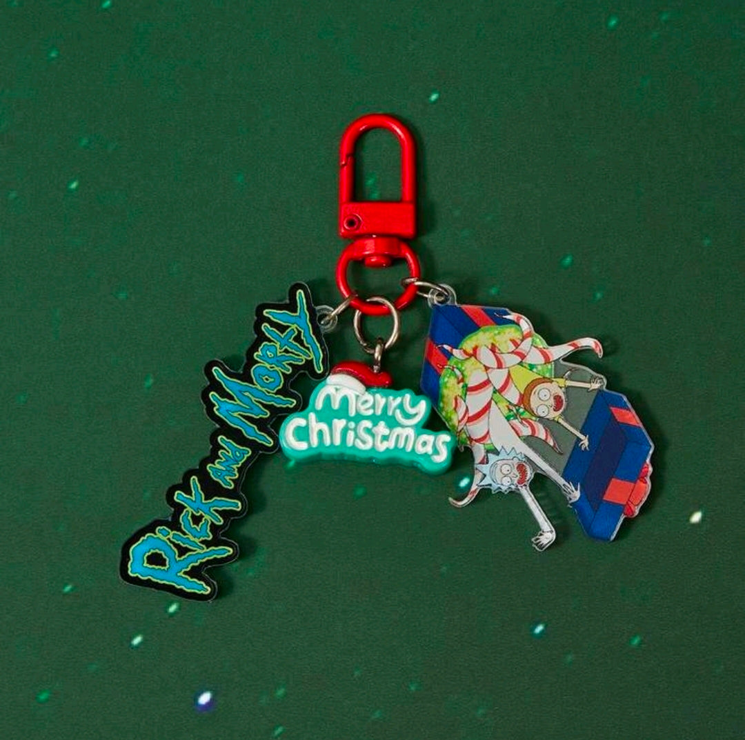 Red carabiner keyring with Rick script, Merry Christmas tag, and Santa elf charm