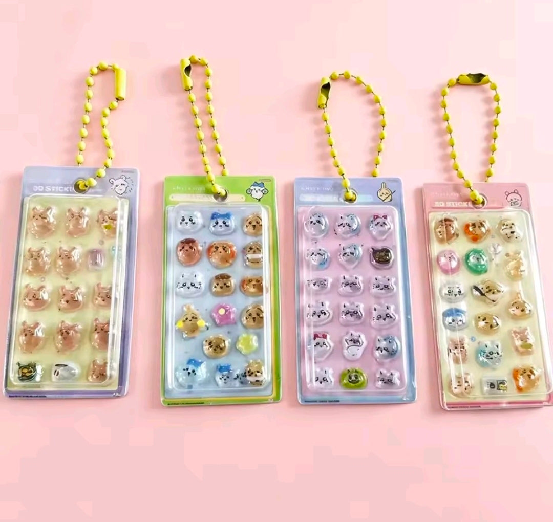 Four Chiikawa sticker keychains in blister packs, each with a neon-yellow bead strap