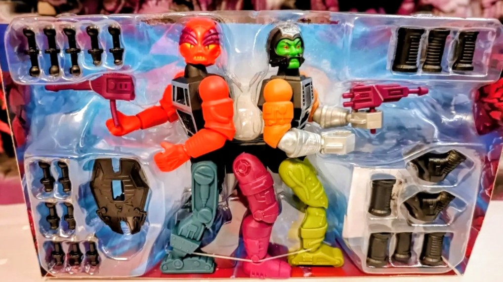Clear blister pack showing colorful evil horde robot figures and weapon parts