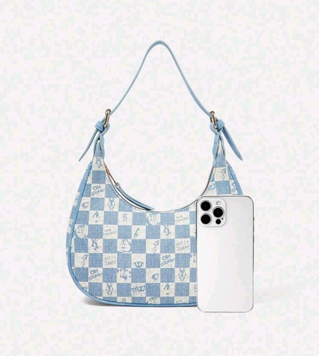 Blue checkered hobo handbag with top zip and a matching white clutch