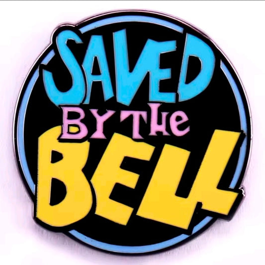 Close-up round enamel pin showing multicolor “Saved by the Bell” logo