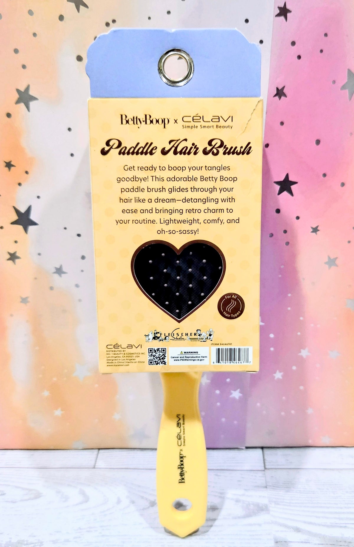Celavi Betty Boop paddle hair brush with yellow handle, shown in retail box