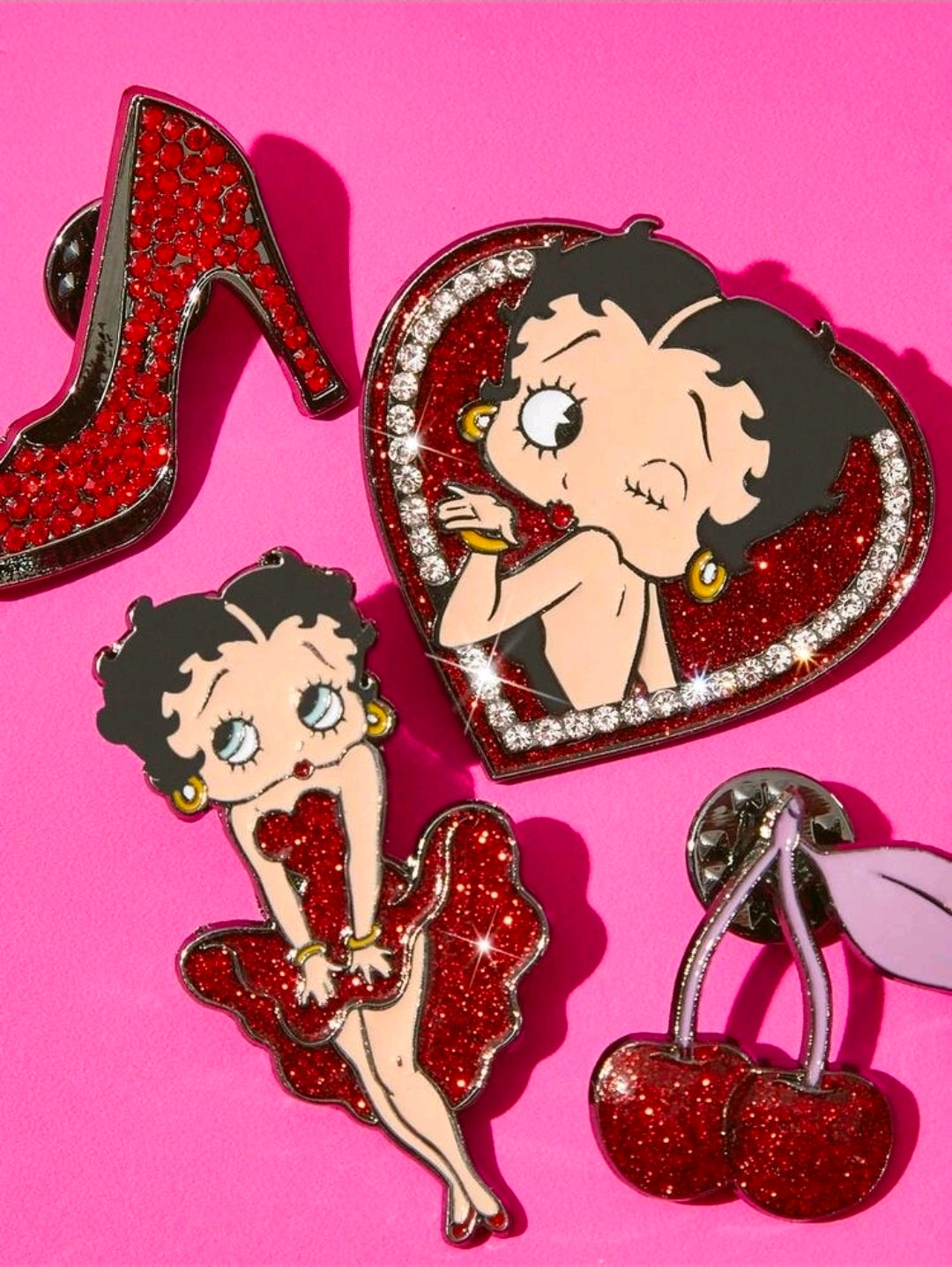 Glitter rhinestone enamel pins: red high heel, Betty Boop heart portrait, standing figure, cherries