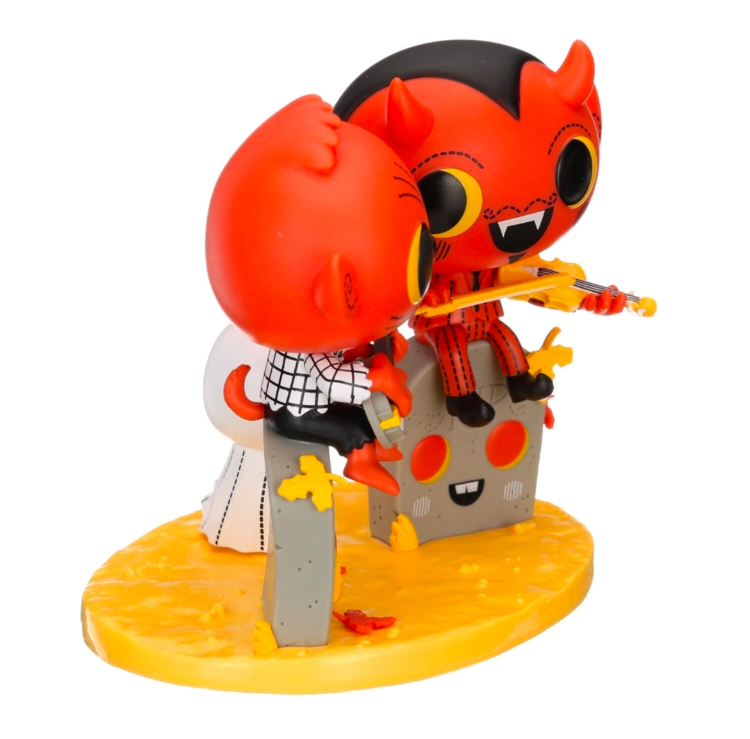 Orange Boo Hollow vinyl figure holding a guitar on a yellow base
