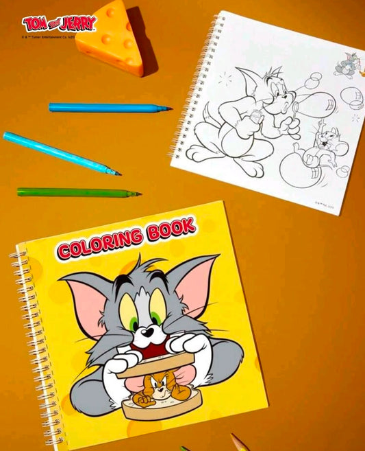 Coloring book and open sketch page with Tom and Jerry line art, crayons and cheese nearby