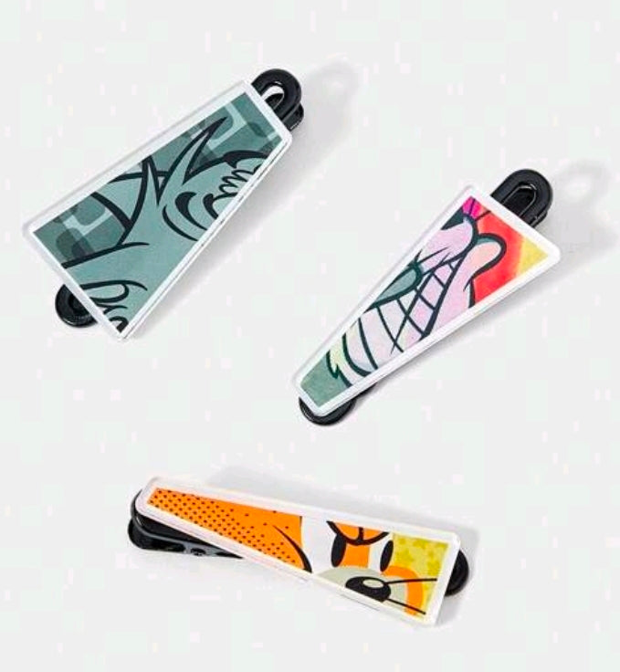 Satin hair clips set with three Tom & Jerry print designs, black spring clasps