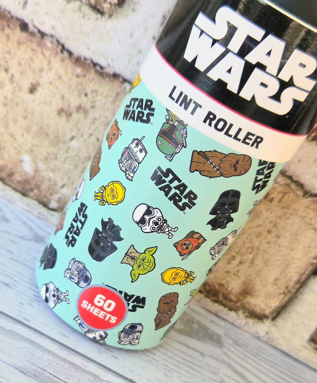 Star Wars lint roller with character icons and 60 sheets
