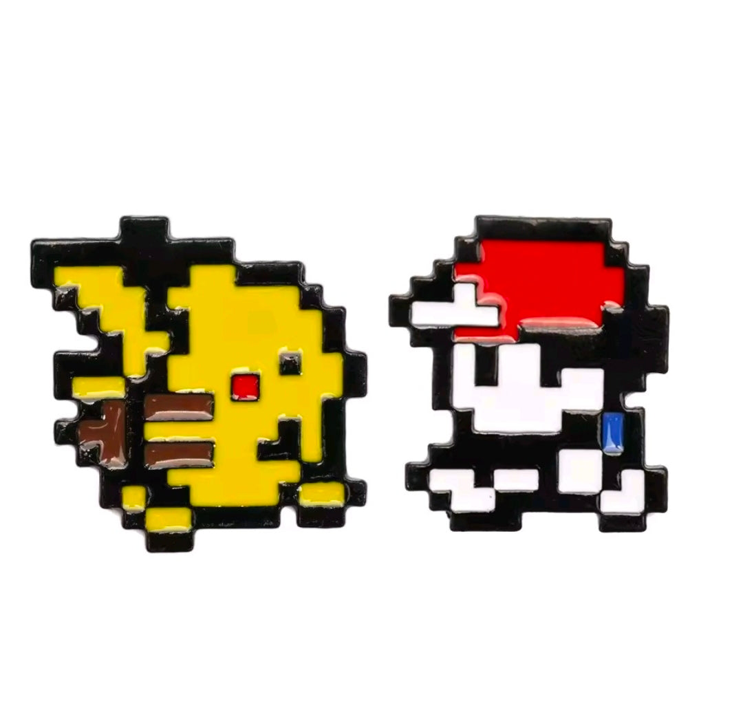 Retro pixel art enamel pin set with Pikachu and a Pokemon trainer