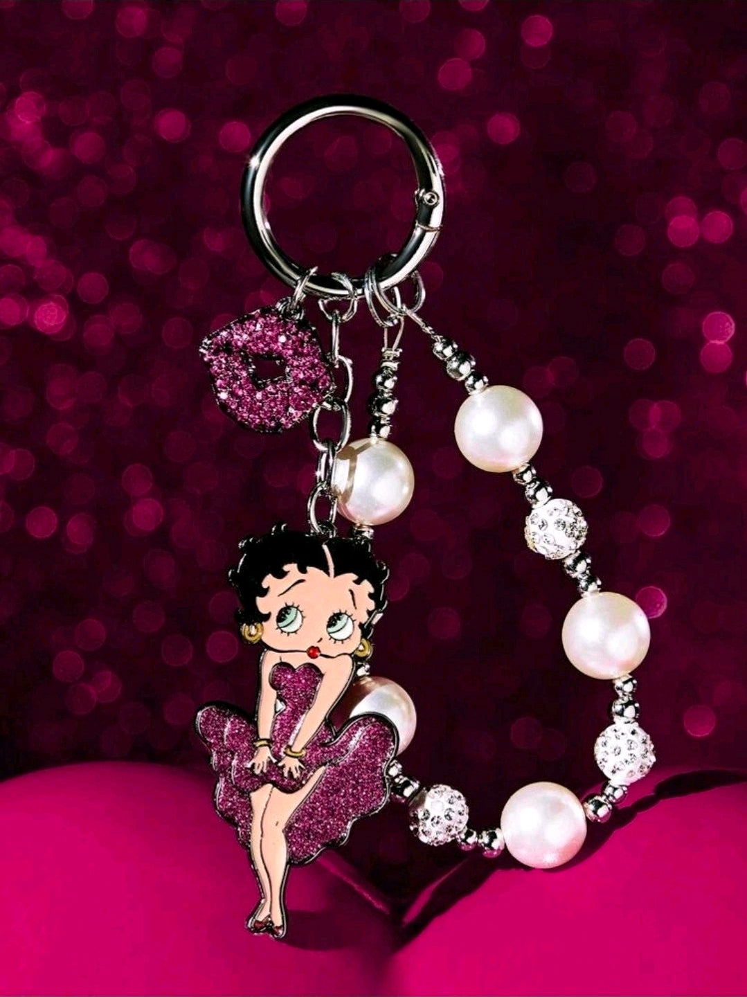 Glitter bead bag charm keychain with pearl beads and Betty Boop-style figure charm
