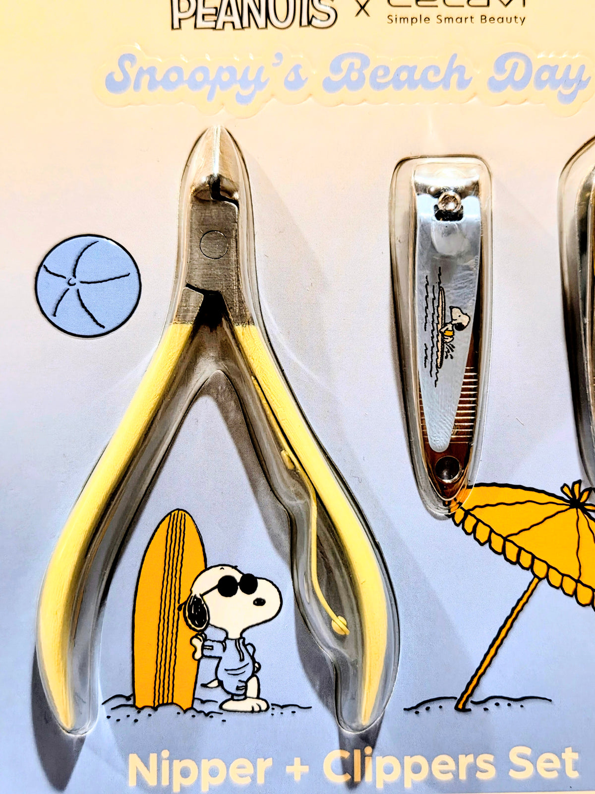 Nipper and clippers blister pack with Snoopy graphics and metal nail tools