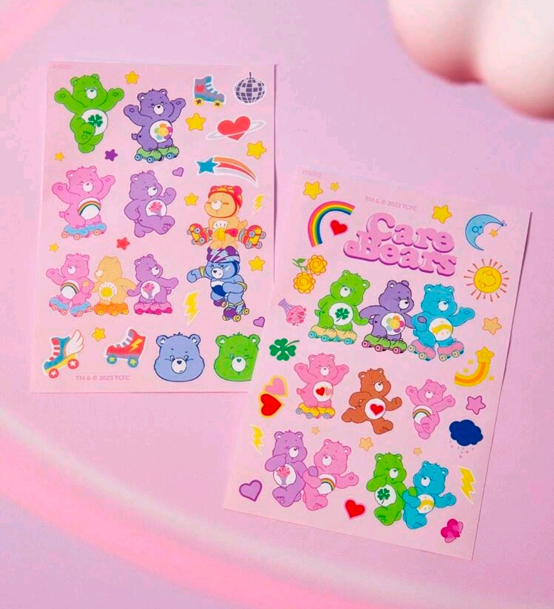 Two-piece sticker sheet set with Care Bears roller skate characters, rainbows, hearts
