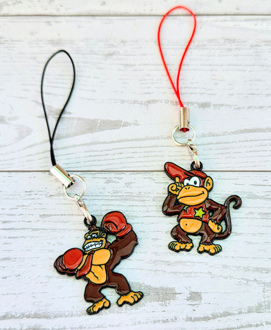 Set of 2 enamel phone charms: Diddy with red strap, Donkey with black strap