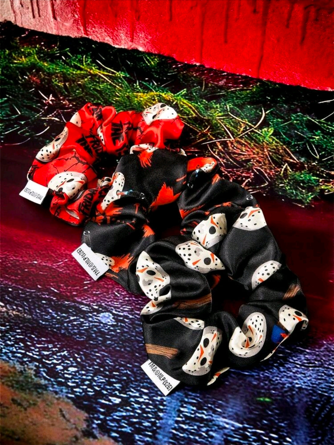 Satin scrunchie set: black and red hair ties with repeating mask character pattern