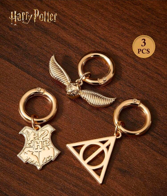 Harry Potter 3 Piece Gold Bag Charm Set Snitch Hogwarts Deathly