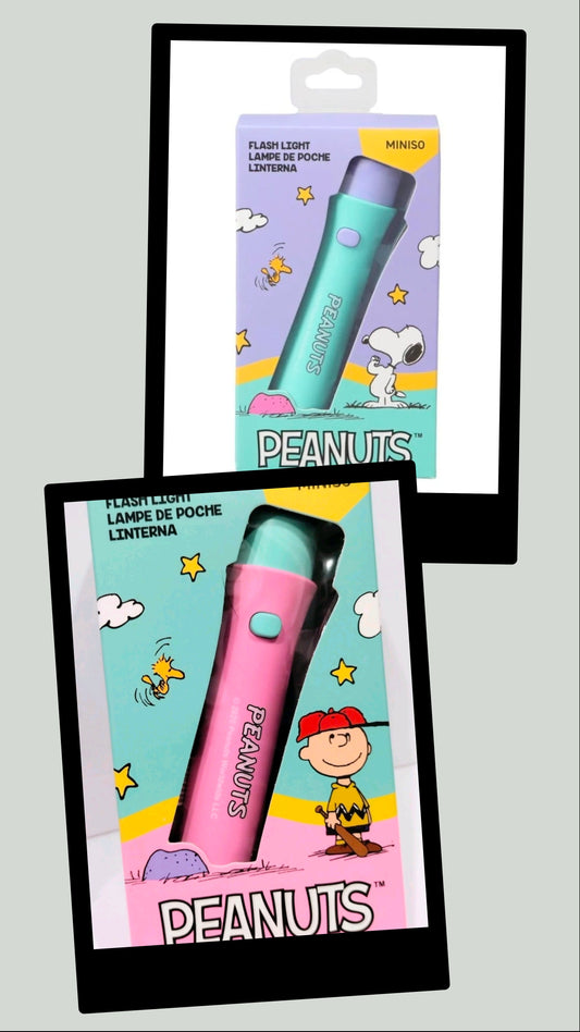 Miniso Peanuts mini LED flashlight keychain wrist strap packaging with Pink and Teal designs