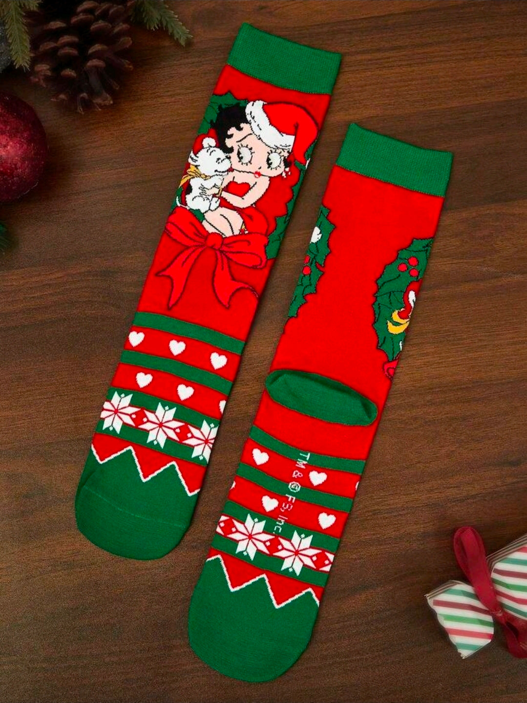 Betty Boop holiday crew socks, red/green with cartoon Santa faces and hearts