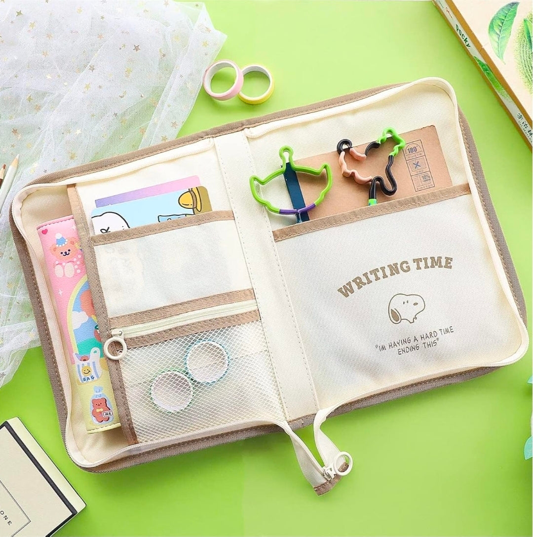 Open beige writing time portfolio organizer with inner pockets, mesh panel, and Snoopy patch