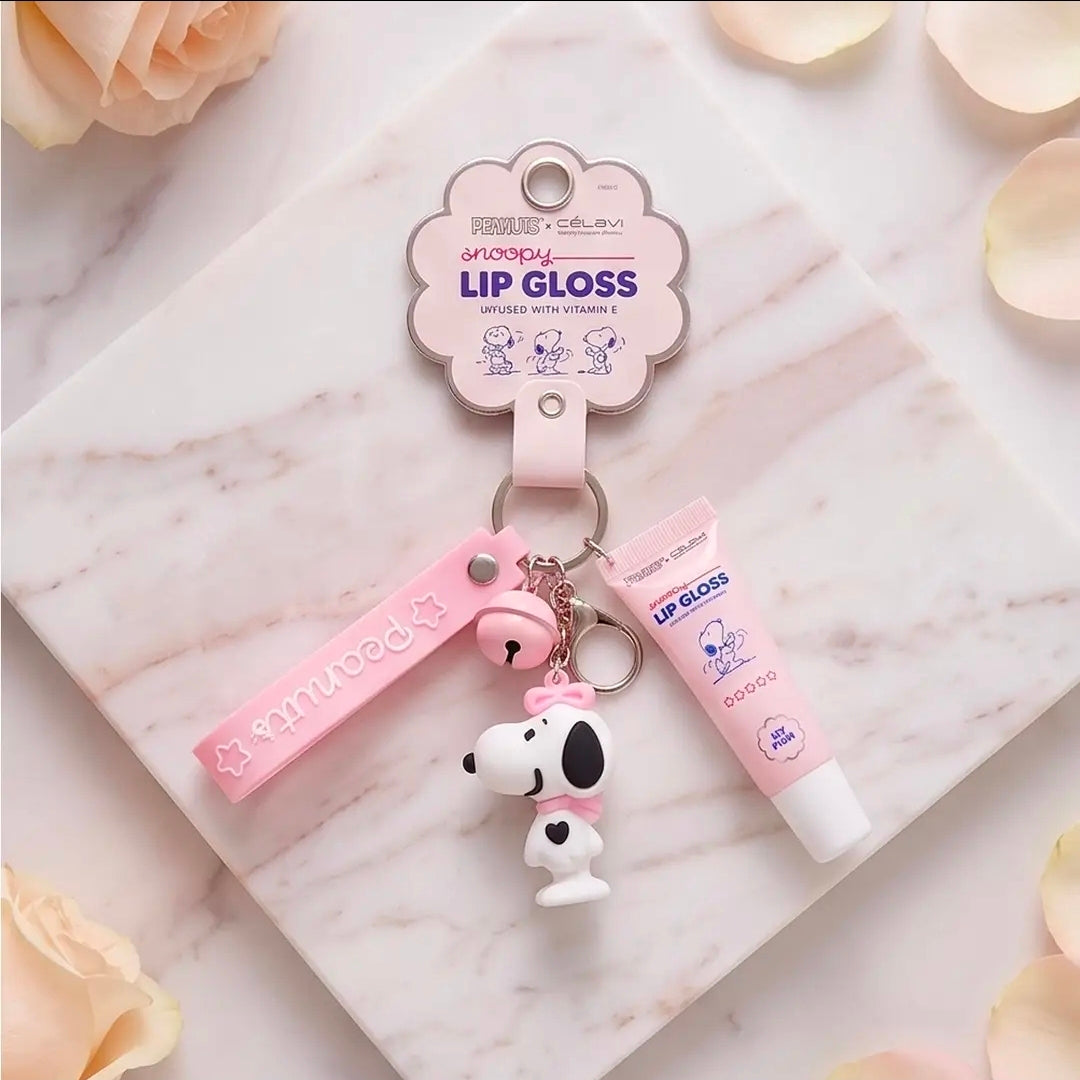 Lip gloss keychain wrist strap set with Snoopy charm and pink lip gloss tube