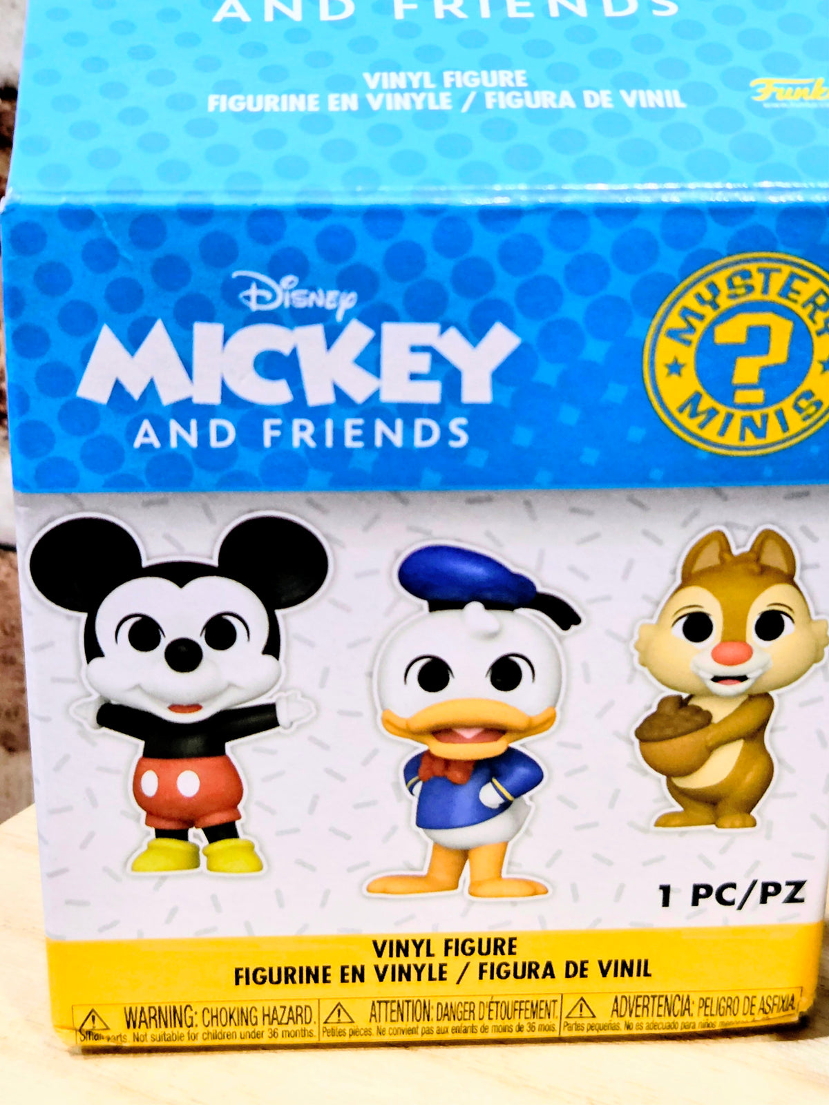 Disney Mickey and Friends mystery vinyl figure box, '1 PC/PZ' on front.
