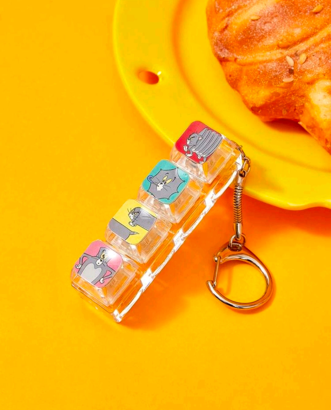 Cartoon keyboard fidget keychain with clear plastic clicker strip, metal keyring, chain