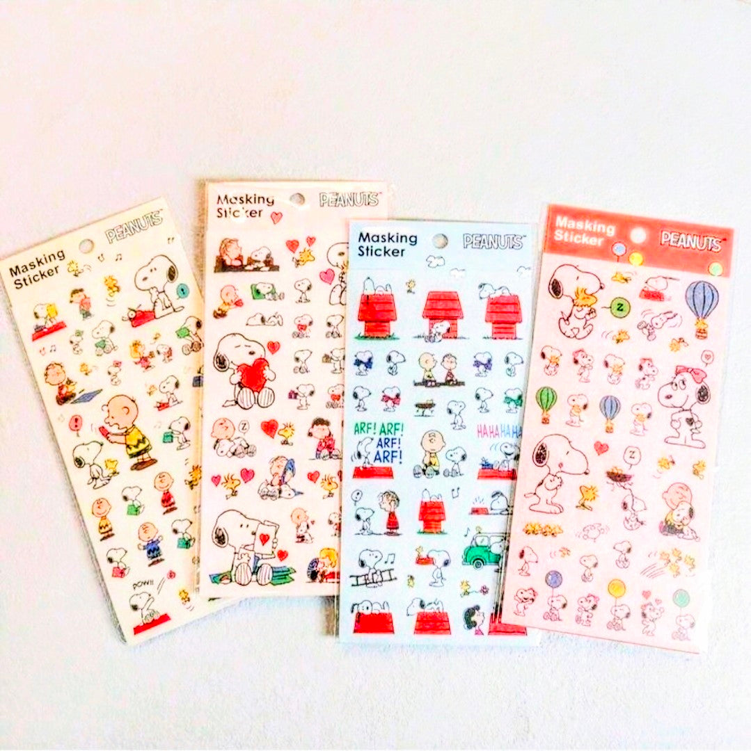 Masking sticker sheets with Snoopy Peanuts characters, four sheets in red, blue, pink, white
