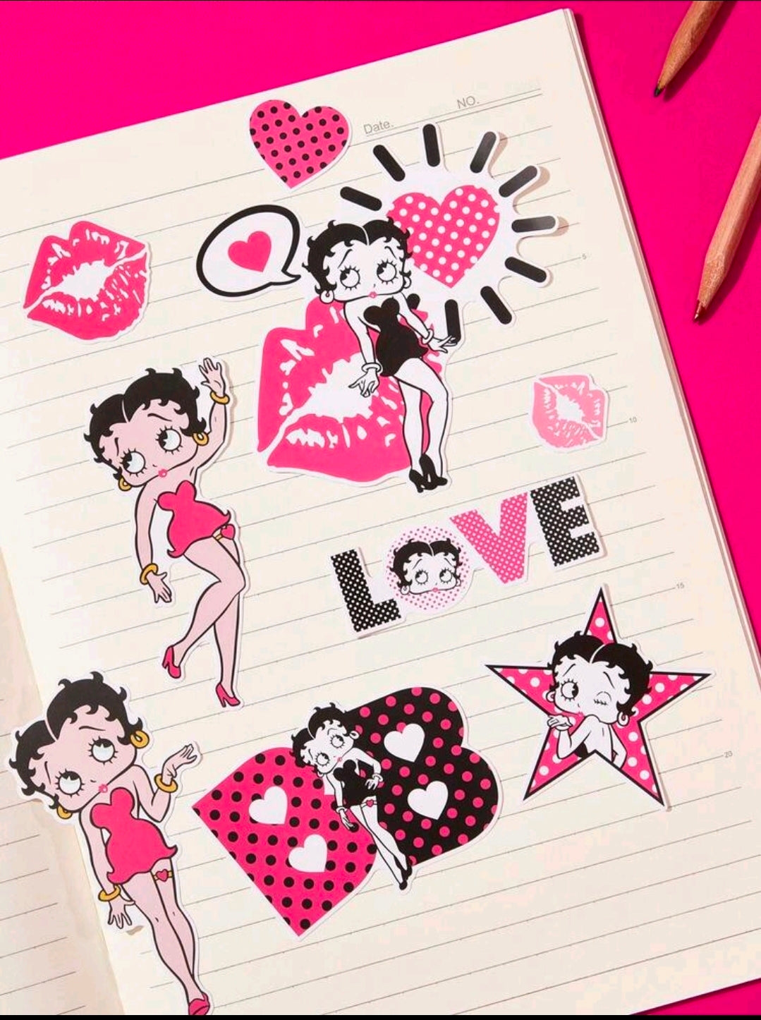 Betty Boop pink vinyl sticker sheet with pin-up girls, hearts, and stars