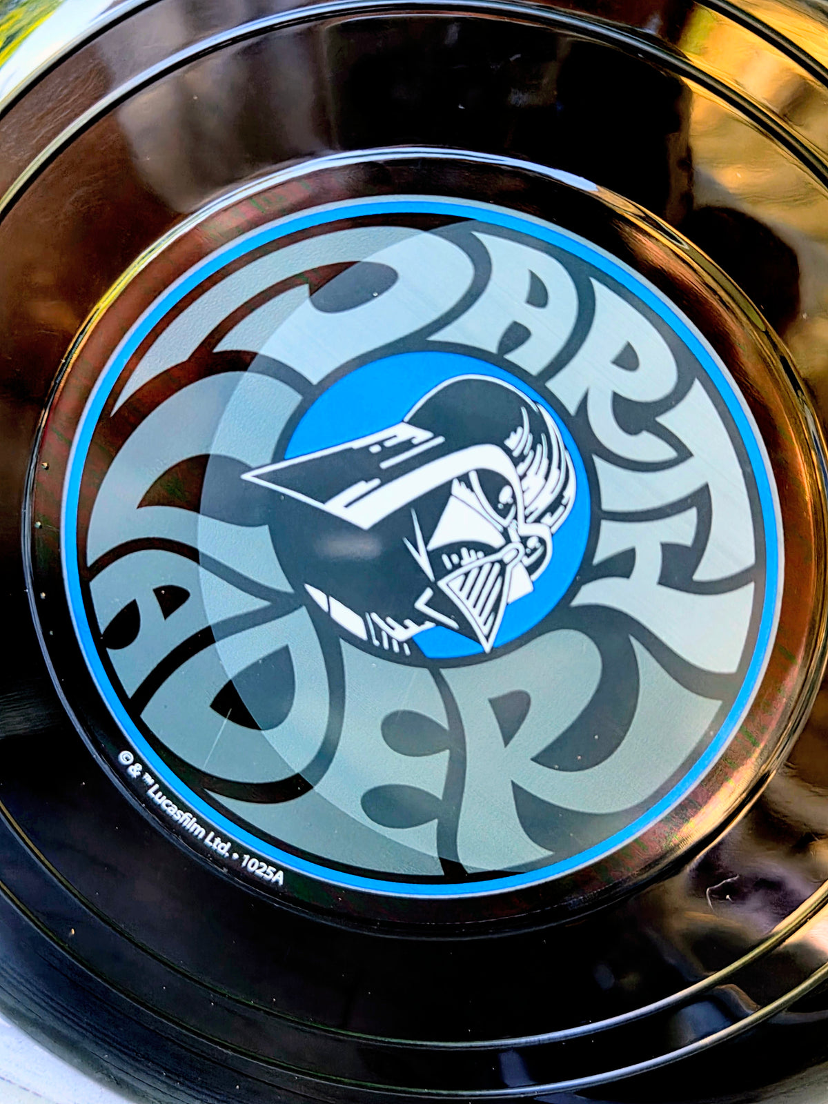 Star Wars Frisbee with Darth Vader graphic over blue ring artwork
