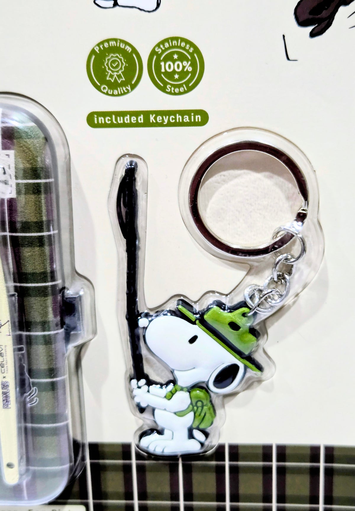 Included keychain with Snoopy and Spike charms on metal ring
