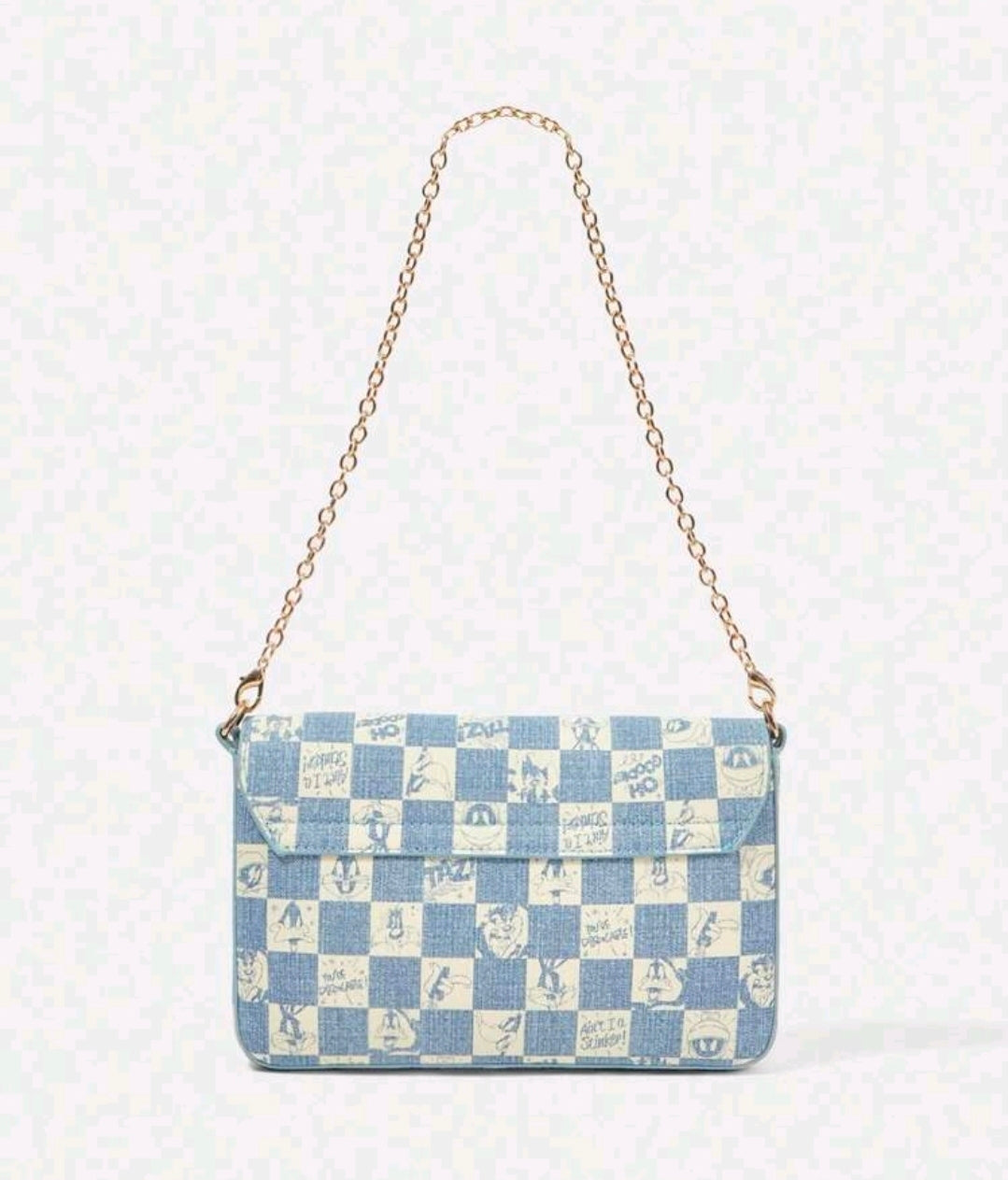 Denim blue checker-pattern crossbody bag with gold chain and flap closure.