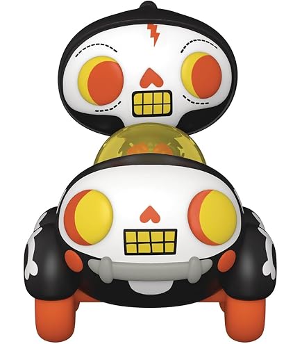 Front view skull-faced black vinyl buggy figure with orange wheels and yellow grille details