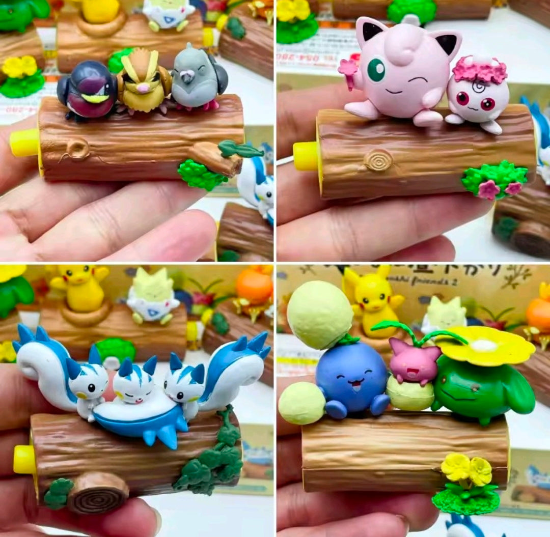 Re-Ment Pokémon figures on a log, featuring four character sets