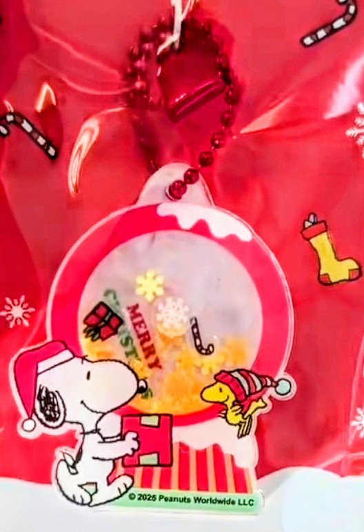 Red Snoopy Christmas charm with Snoopy and nutcracker inside a clear circle