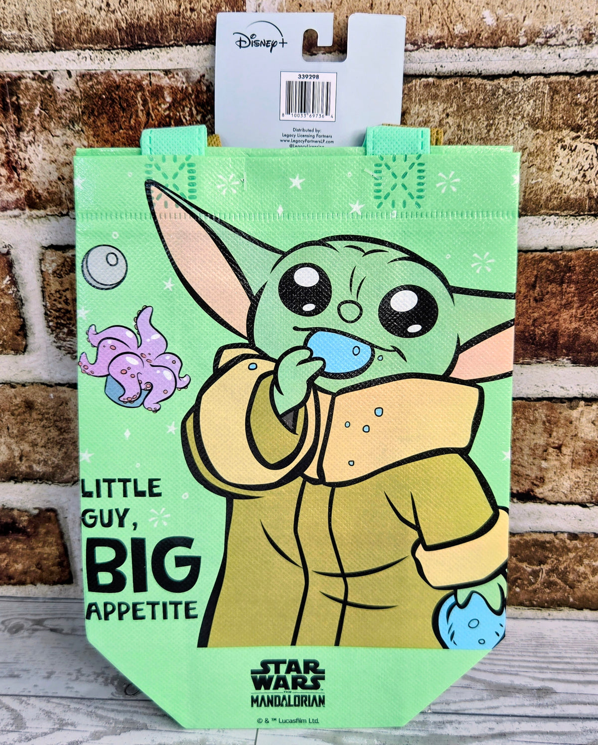 Green Star Wars Grogu tote bag with character illustration and stars