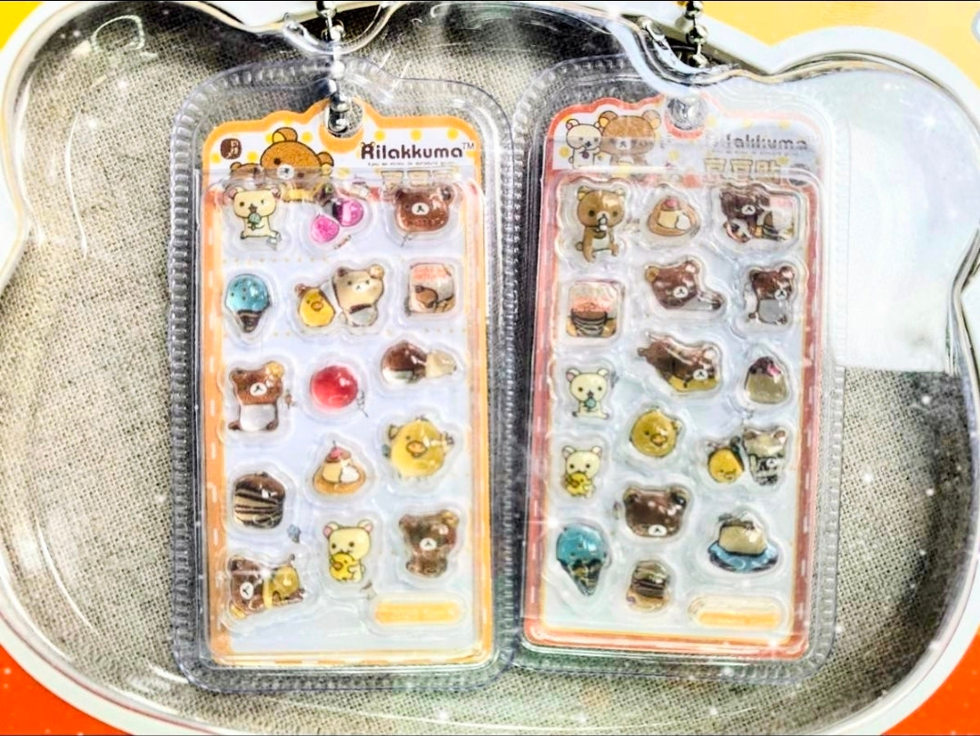 Rilakkuma sticker keychains set of 2, two clear blister cards with assorted mini stickers