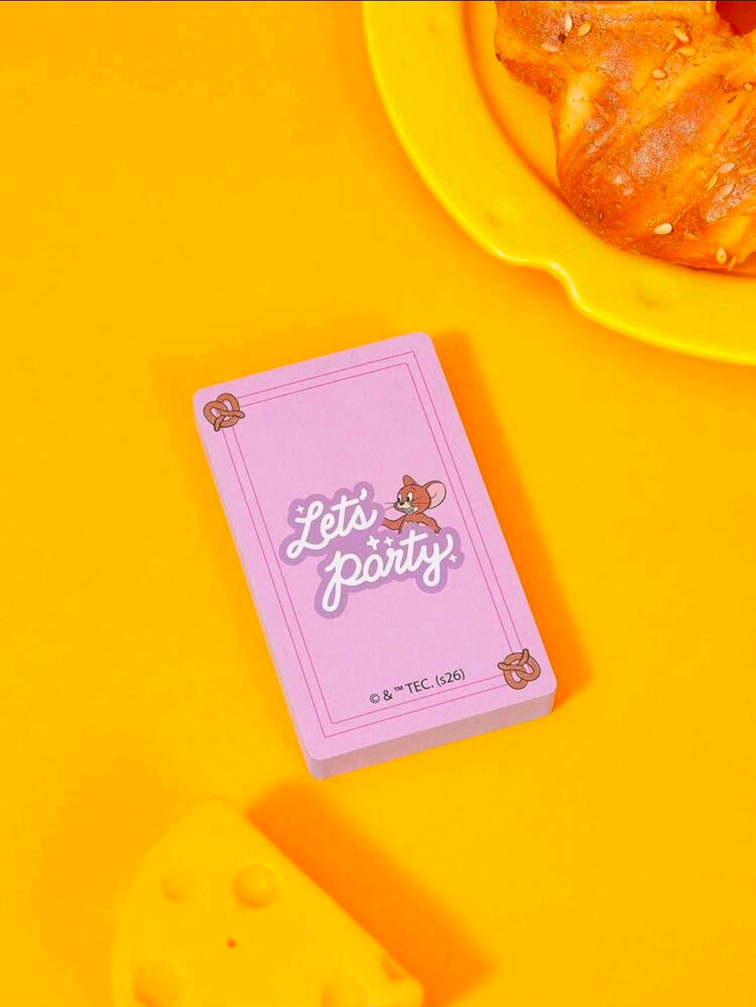 Tom & Jerry “Let’s Party” playing card deck with purple back and bow icons