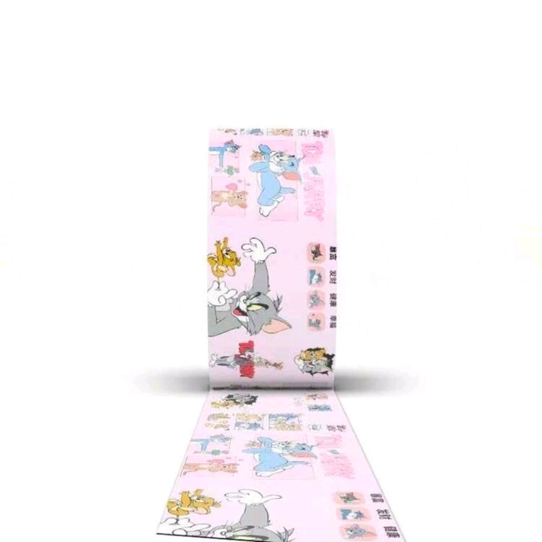 Pink washi masking tape roll with Tom & Jerry cartoon panel pattern