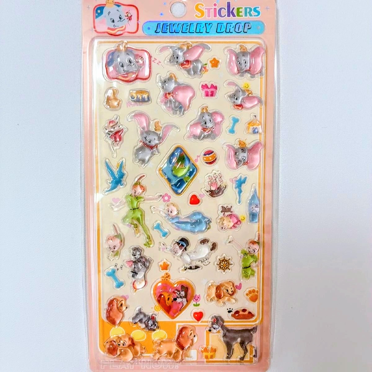 Disney jewelry drop sticker sheet featuring hearts, rabbits, and blue butterflies