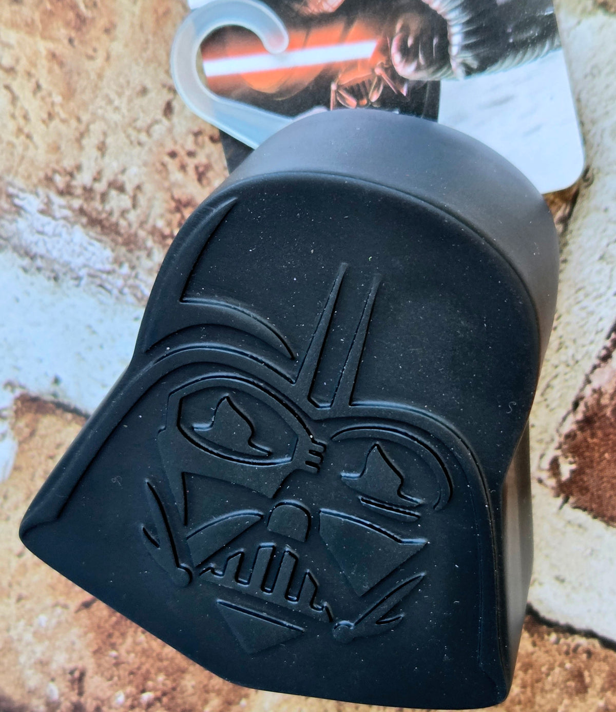 Star Wars pet food cover in Darth Vader style, dark molded plastic.
