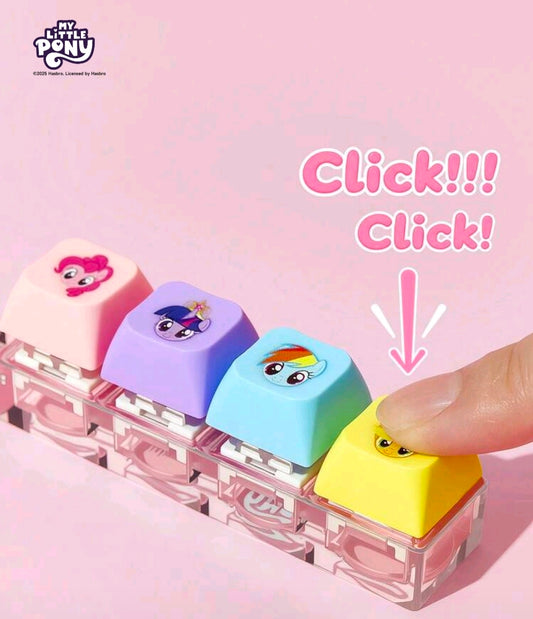 Keyboard clicker fidget keychain with clear base and finger pressing yellow pony key