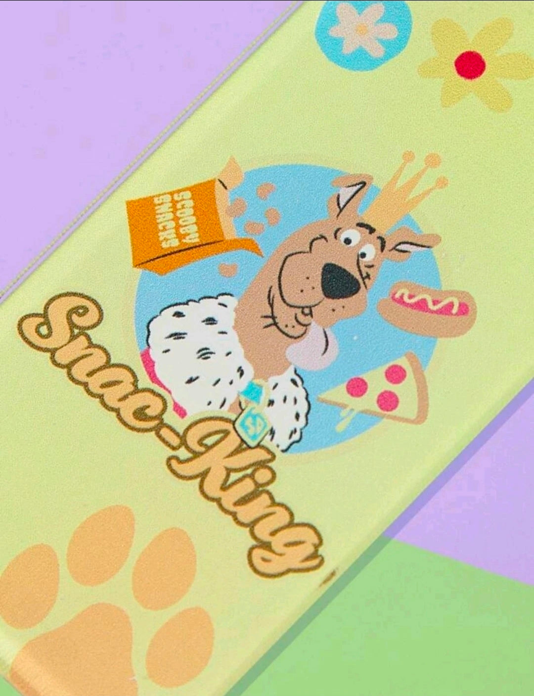 Green Scooby-Doo makeup pouch with black zipper and dog-themed illustration