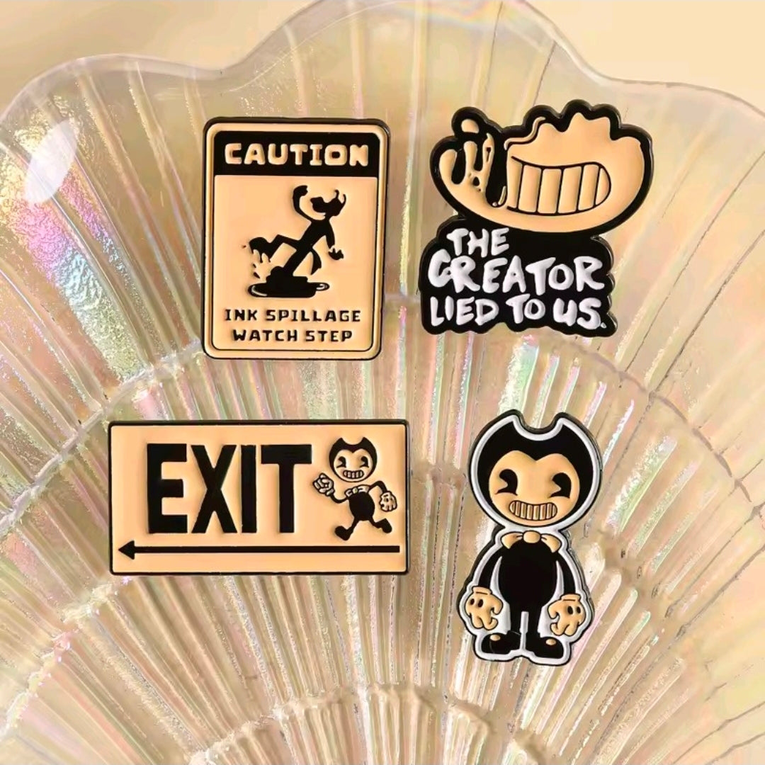 Four enamel pins on iridescent shell: Caution, EXIT, The Creator Lied to Us, hooded figure